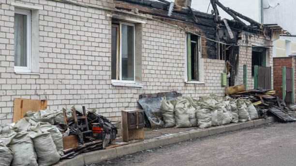 Professional Fire Damage Restoration technician working in Randolph, WI